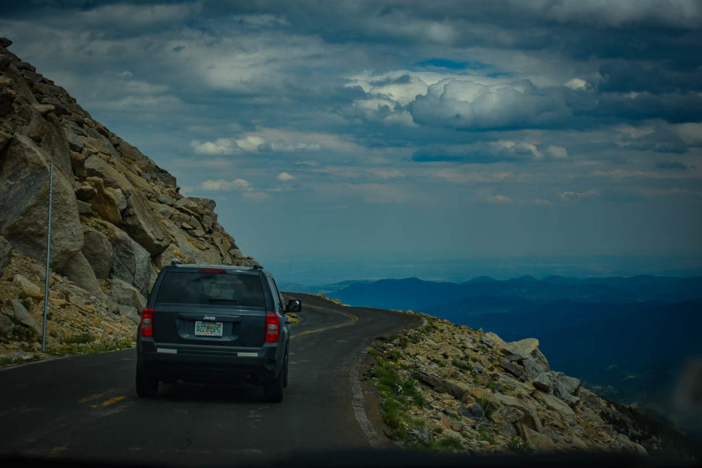 The road up to Mt. Evans is a winding, steep, narrow, white knuckle drive.