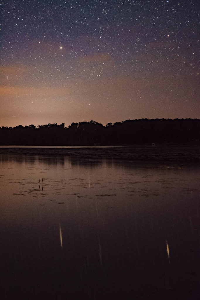 Stars relfected on gentle waves in Bass Lake