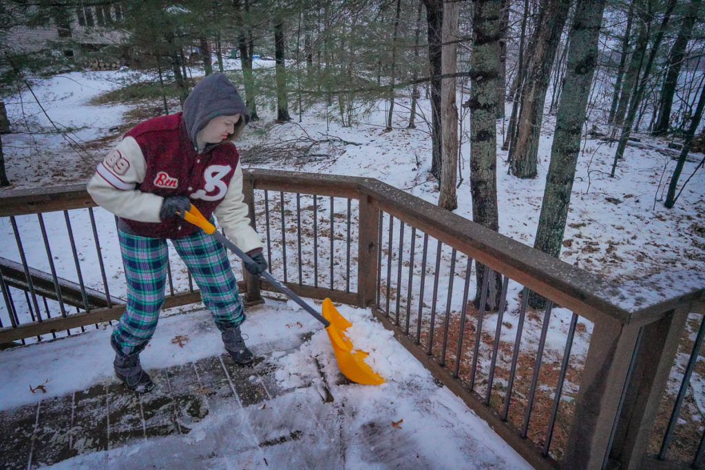 Nora loves helping out in any way she can. Here she is shovelling snow off the deck.  Never complains, this one.